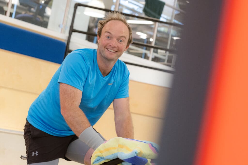 George Yeoman riding bike in charity bike ride