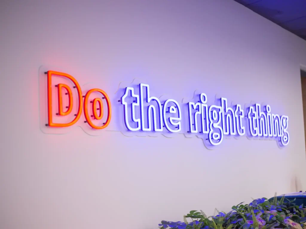 sign on wall saying do the right thing